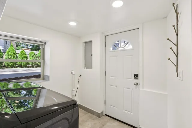 a room with furniture and a window