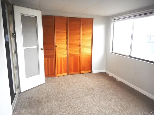 a workspace with furniture and potted plant