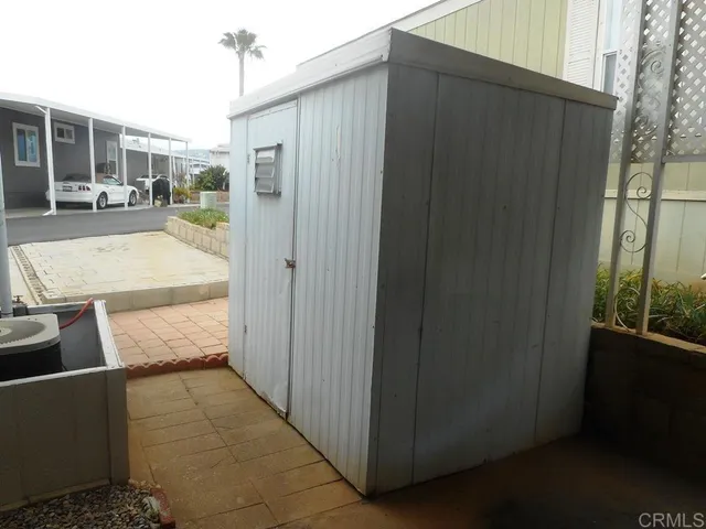 a kitchen with stainless steel appliances a sink and a refrigerator