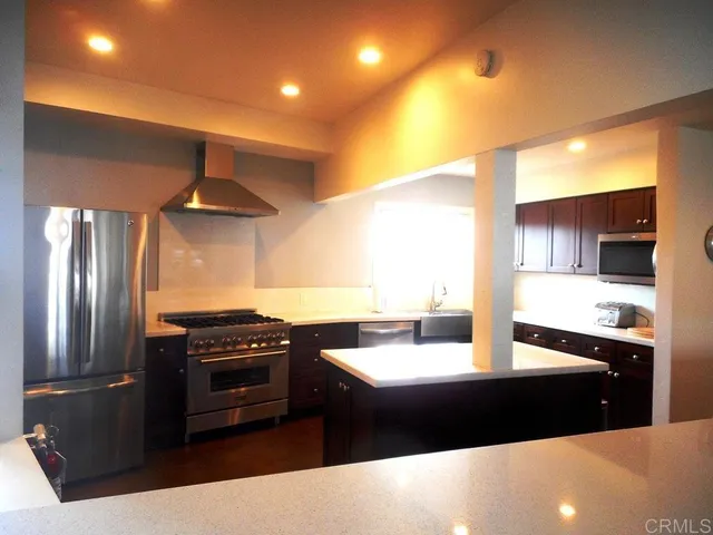 a view of a back yard of the house