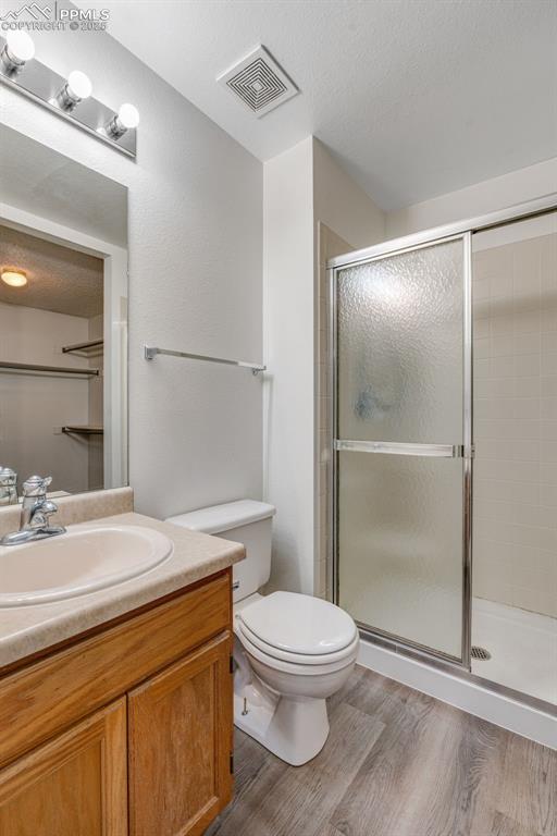 730 Mediterranean Point Colorado Springs, CO 80910 - Photo 13 of 30 a bathroom with a sink a toilet and shower