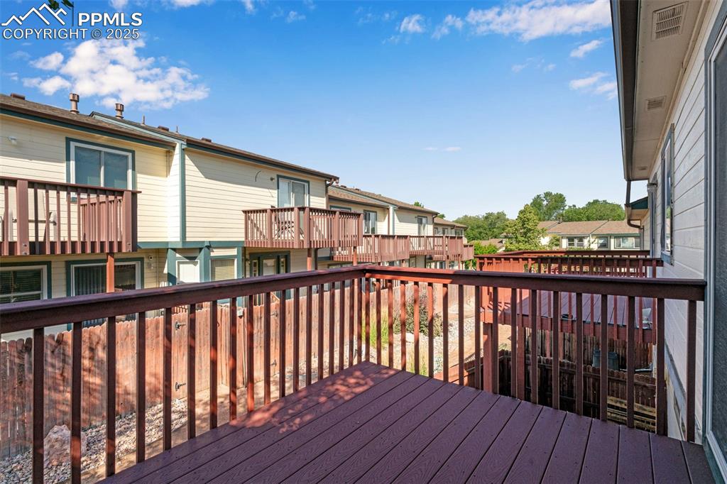 730 Mediterranean Point Colorado Springs, CO 80910 - Photo 16 of 30 a view of a balcony with wooden floor