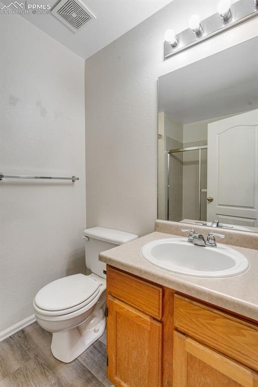 730 Mediterranean Point Colorado Springs, CO 80910 - Photo 19 of 30 a bathroom with a sink a toilet and shower
