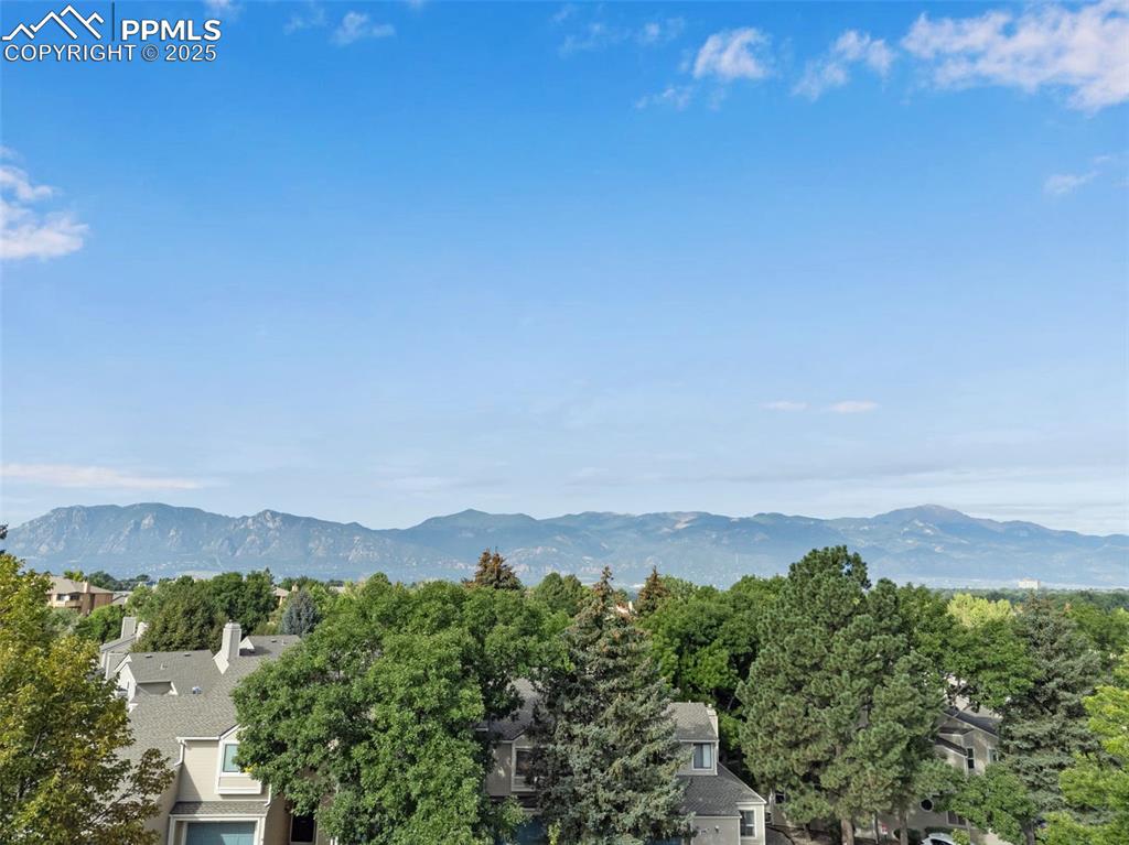 730 Mediterranean Point Colorado Springs, CO 80910 - Photo 30 of 30 a view of a city with mountains in the background