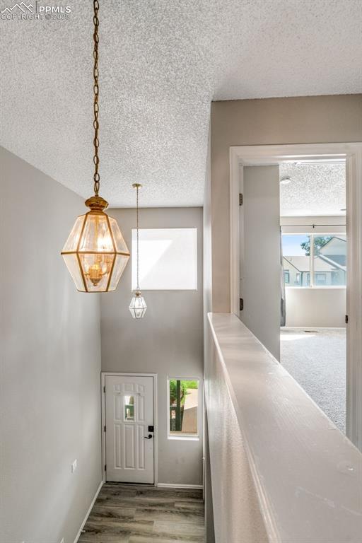 730 Mediterranean Point Colorado Springs, CO 80910 - Photo 10 of 30 a view of hallway with wooden floor