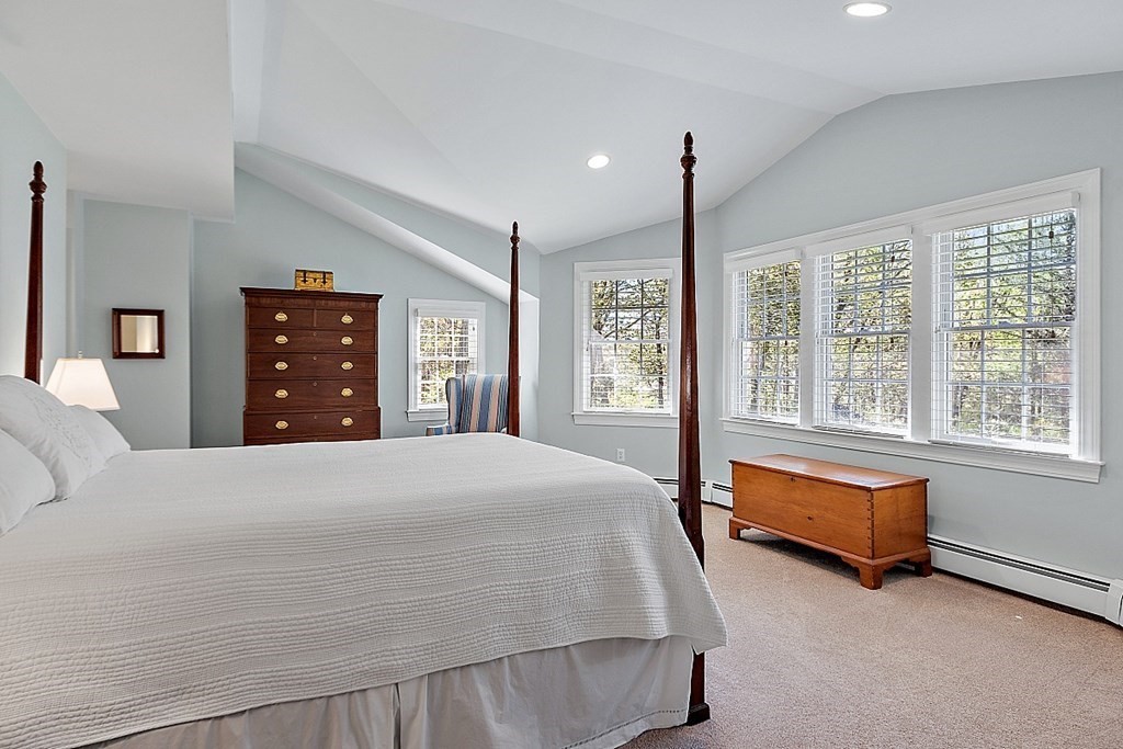 537 Barretts Mill Road Concord, MA 01742 - Photo 19 of 35 a bedroom with a large bed and a window