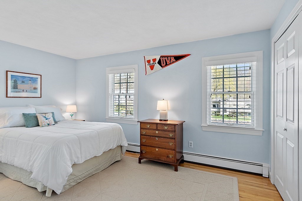 537 Barretts Mill Road Concord, MA 01742 - Photo 24 of 35 a bedroom with a bed and a window