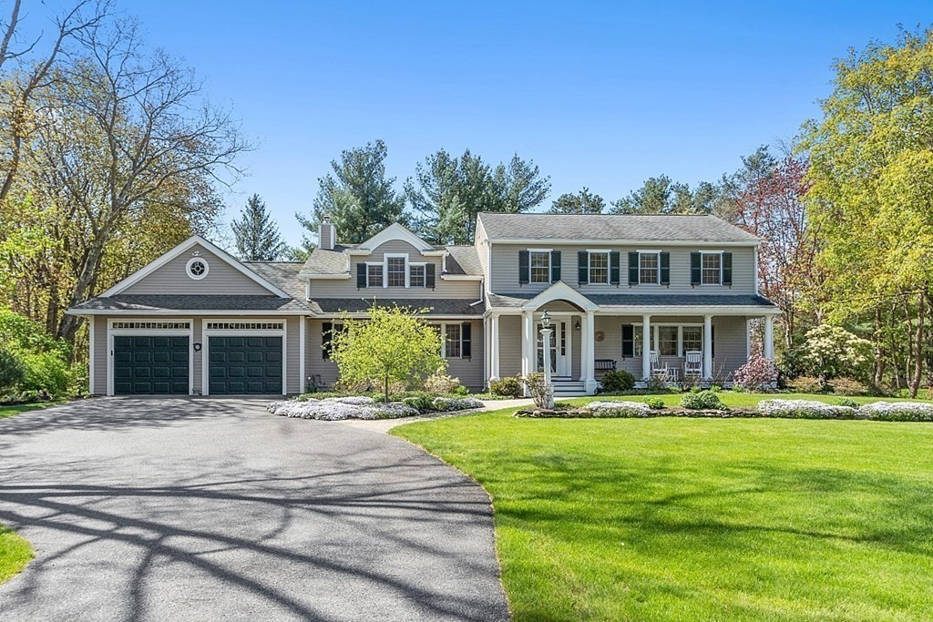 537 Barretts Mill Road Concord, MA 01742 - Photo 34 of 35 a front view of a house with a yard