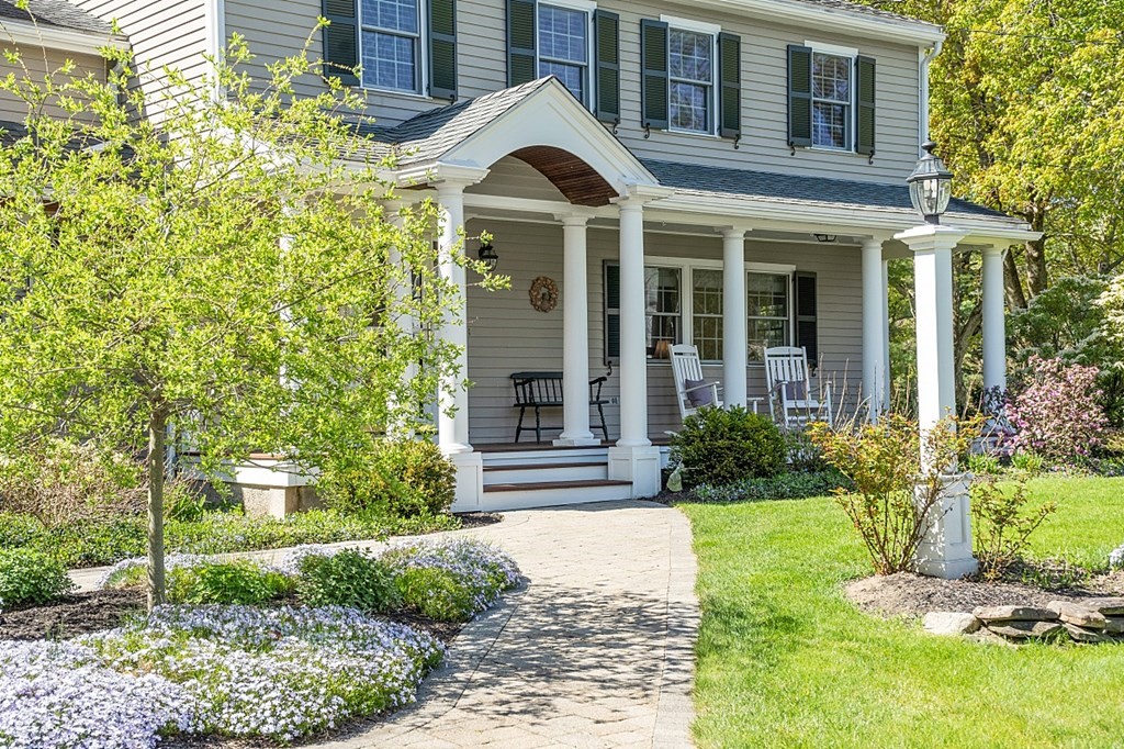 537 Barretts Mill Road Concord, MA 01742 - Photo 4 of 35 a front view of a house with garden