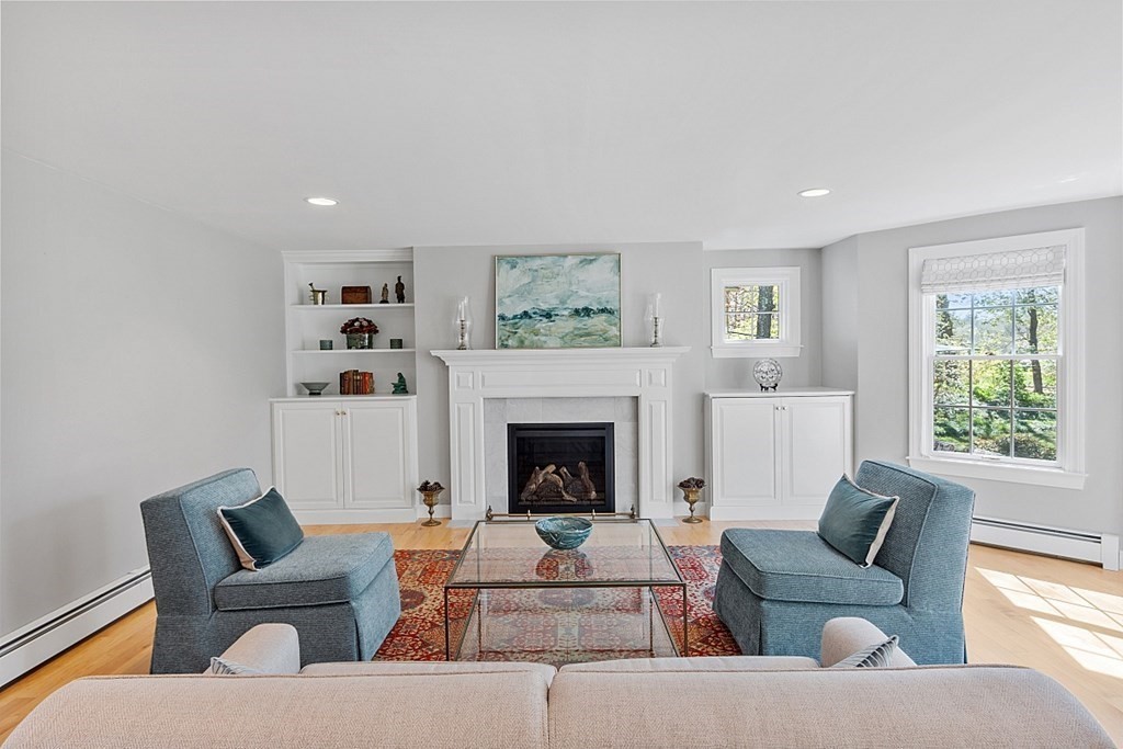 537 Barretts Mill Road Concord, MA 01742 - Photo 5 of 35 a living room with furniture fireplace and window