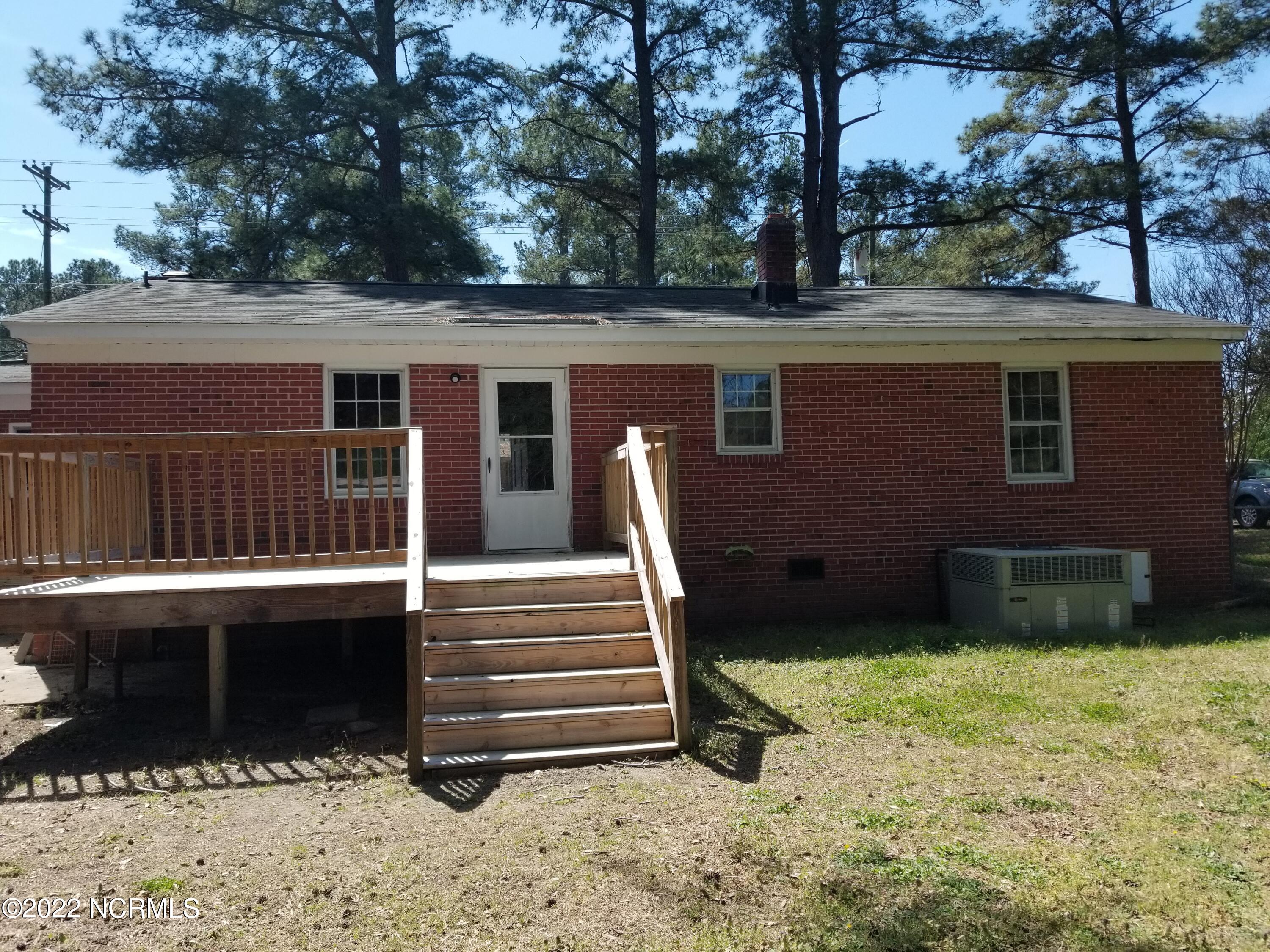 1528 Bethlehem Road Rocky Mount, NC 27803 - Photo 10 of 11 Nice deck off back kitchen door
