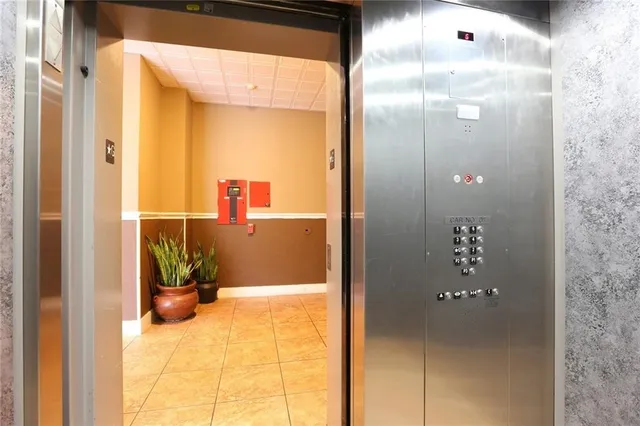 a view of a hallway with a large window