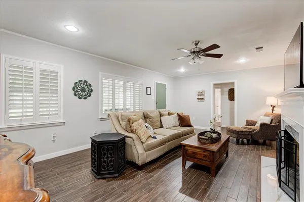 a living room with furniture or couch and a window