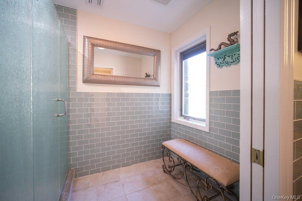 237 Mineral Springs Road Highland Mills, NY 10930 - Photo 26 of 32 a bathroom with a toilet a sink and mirror
