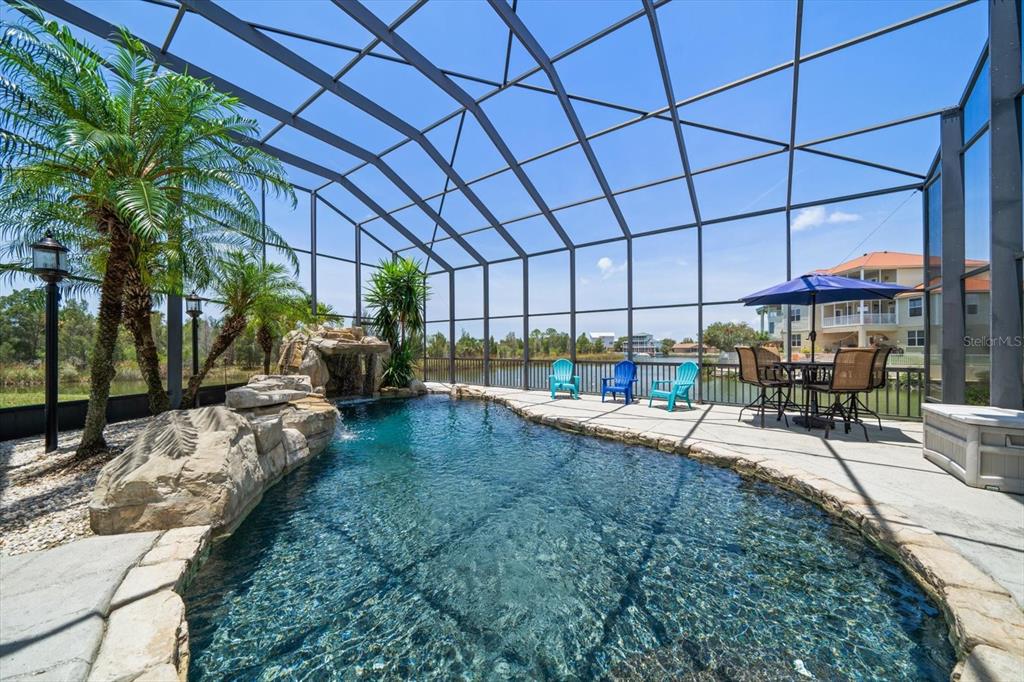 3397 Bluefish Drive Hernando Beach, FL 34607 - Photo 27 of 65 a view of a backyard with patio