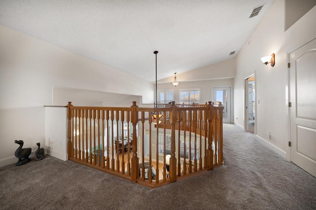 3397 Bluefish Drive Hernando Beach, FL 34607 - Photo 40 of 65 a view of a hallway with stairs