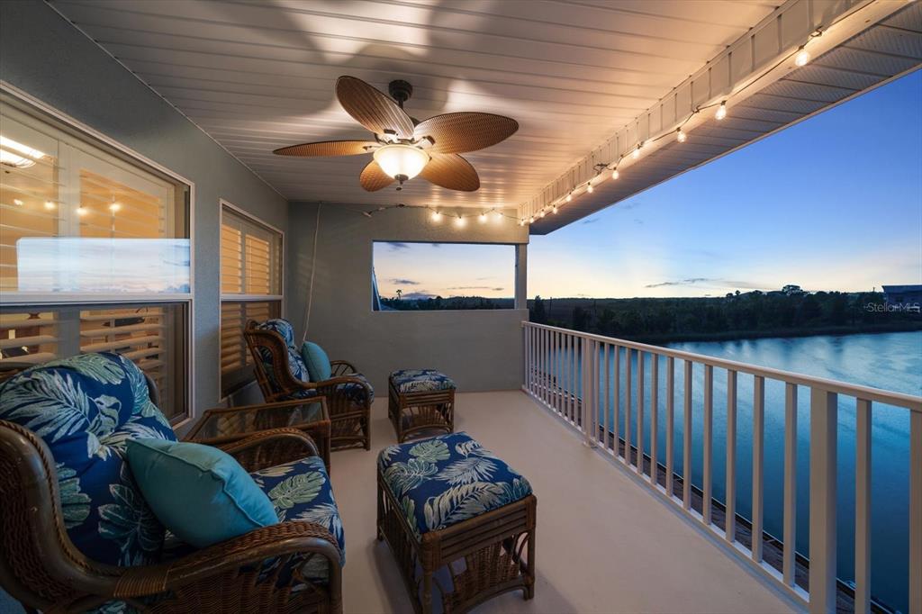 3397 Bluefish Drive Hernando Beach, FL 34607 - Photo 40 of 49 a bedroom with furniture and a chandelier