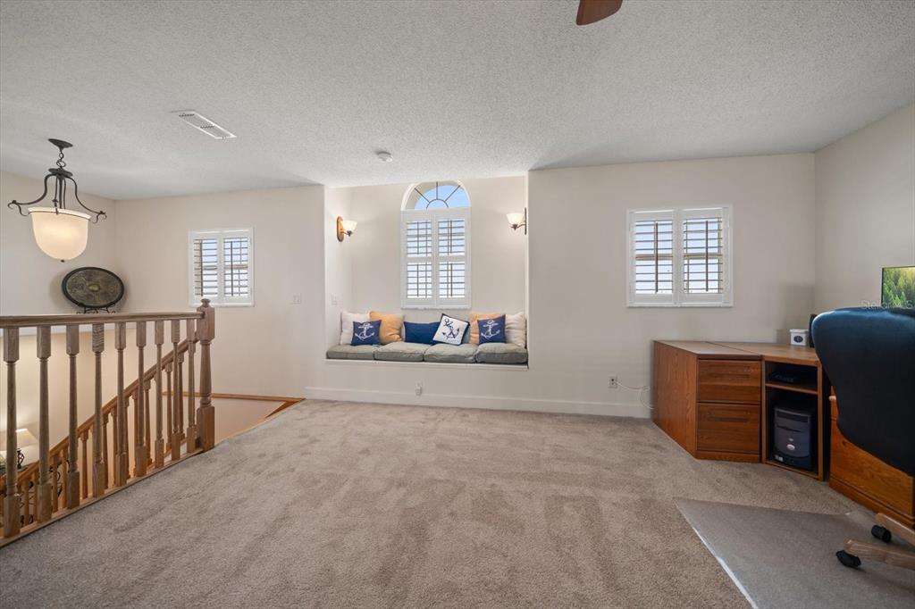 3397 Bluefish Drive Hernando Beach, FL 34607 - Photo 42 of 65 a view of a workspace with furniture and a window