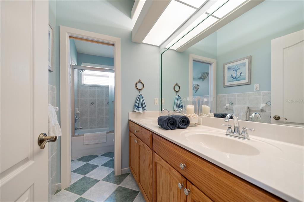 3397 Bluefish Drive Hernando Beach, FL 34607 - Photo 43 of 49 a bathroom with a sink a toilet and shower