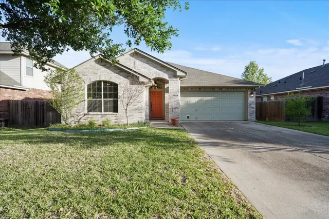 a front view of house with yard