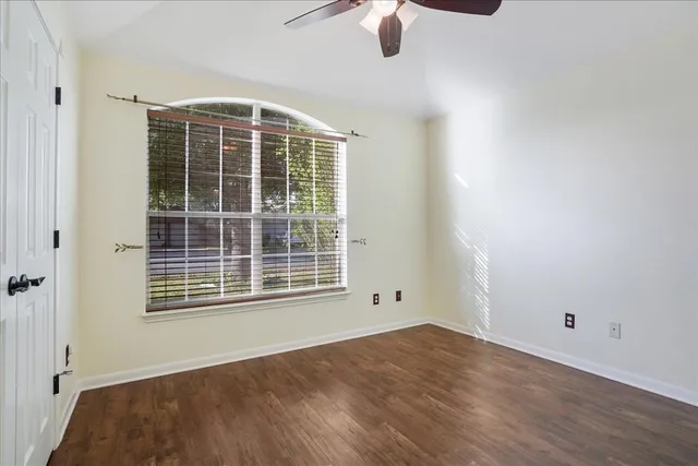 an empty room with windows