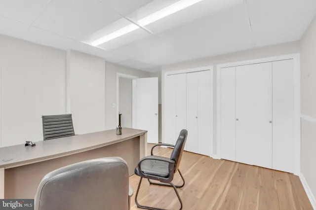 a view of a workspace with furniture