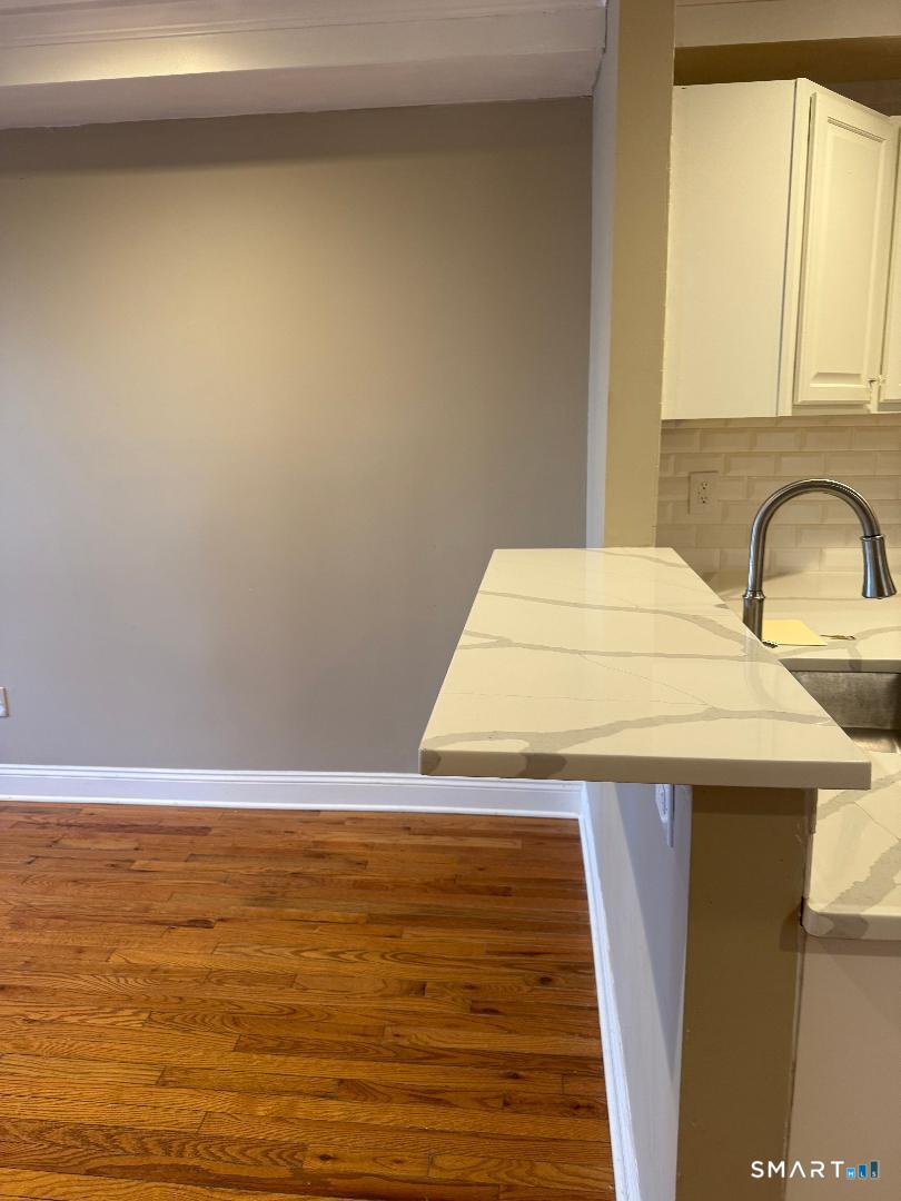 1 Beaver Brook Road, Unit 29 Danbury, CT 06810 - Photo 14 of 16 a close view of sink and tap