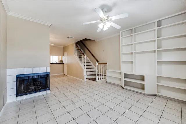 a view of entryway and hall with a workspace