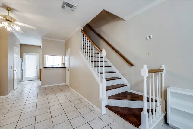 a view of a hallway with the wooden floor