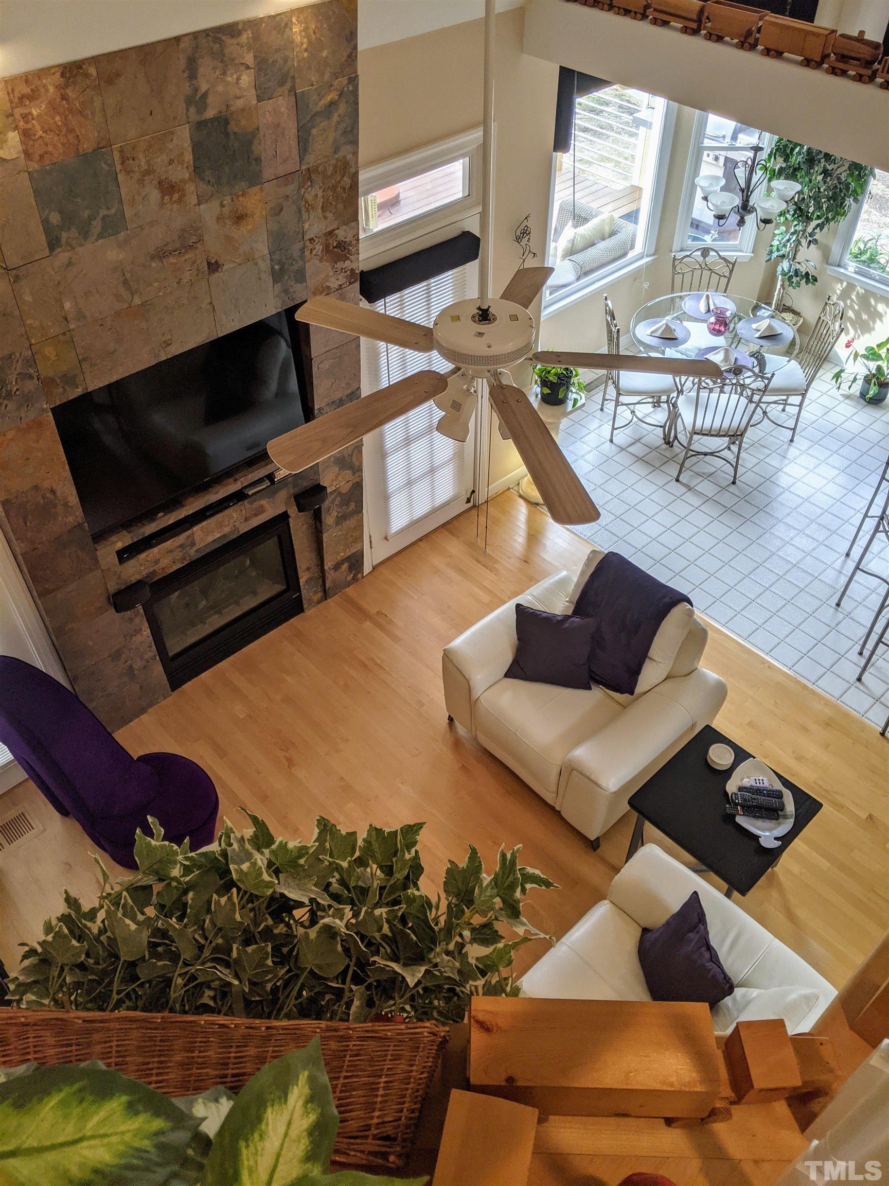 2405 Andor Place Raleigh, NC 27604 - Photo 3 of 30 a living room with furniture and a wooden floor