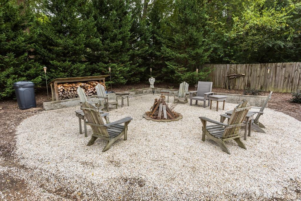 2405 Andor Place Raleigh, NC 27604 - Photo 25 of 30 a view of a backyard with a table and chairs