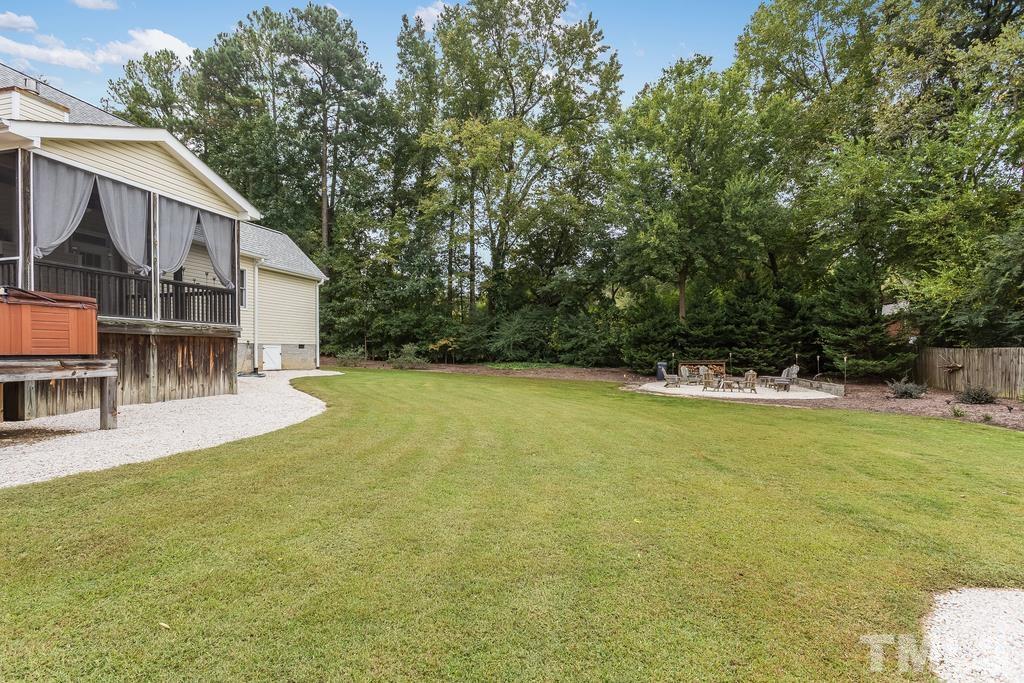 2405 Andor Place Raleigh, NC 27604 - Photo 29 of 30 a view of house with swimming pool and sitting area