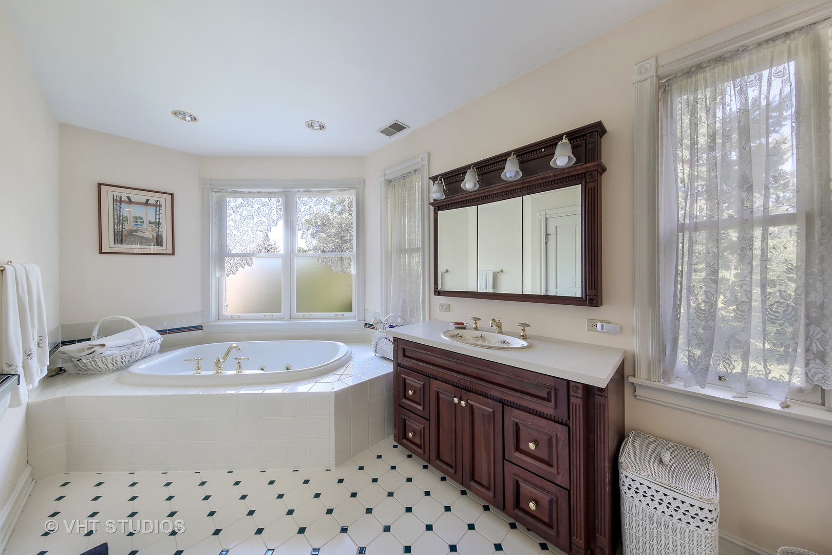 5324 Turvey Court Downers Grove, IL 60515 - Photo 13 of 27 a bathroom with a double vanity sink mirror and bathtub