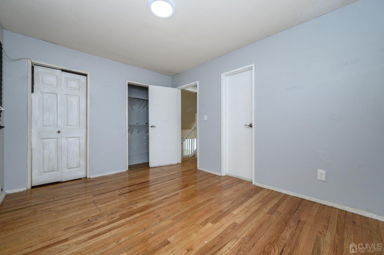 186 Central Avenue Edison, NJ 08817 - Photo 20 of 32 a view of empty room with wooden floor