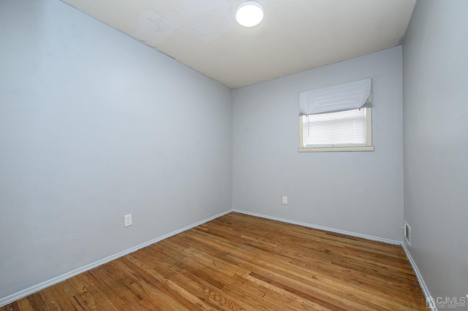186 Central Avenue Edison, NJ 08817 - Photo 22 of 32 wooden floor in a room