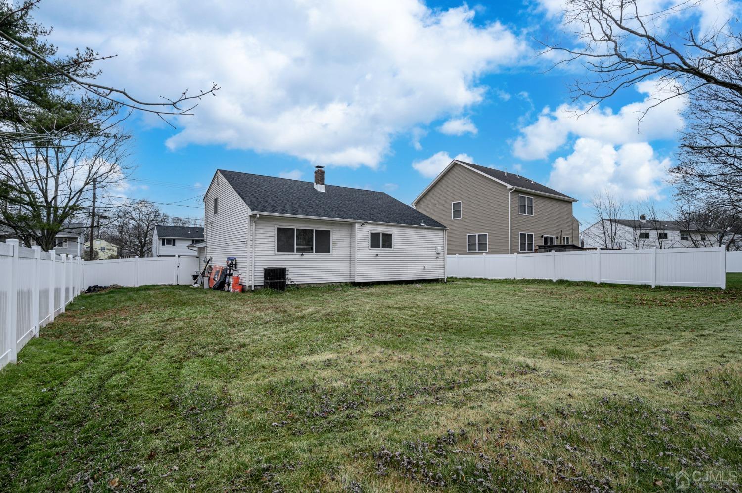 186 Central Avenue Edison, NJ 08817 - Photo 29 of 32 a front view of a house with garden