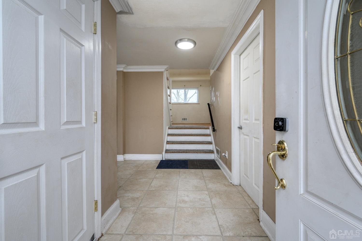 186 Central Avenue Edison, NJ 08817 - Photo 3 of 32 a view of a hallway view with staircase