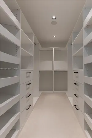 a white bath tub sitting in a bathroom
