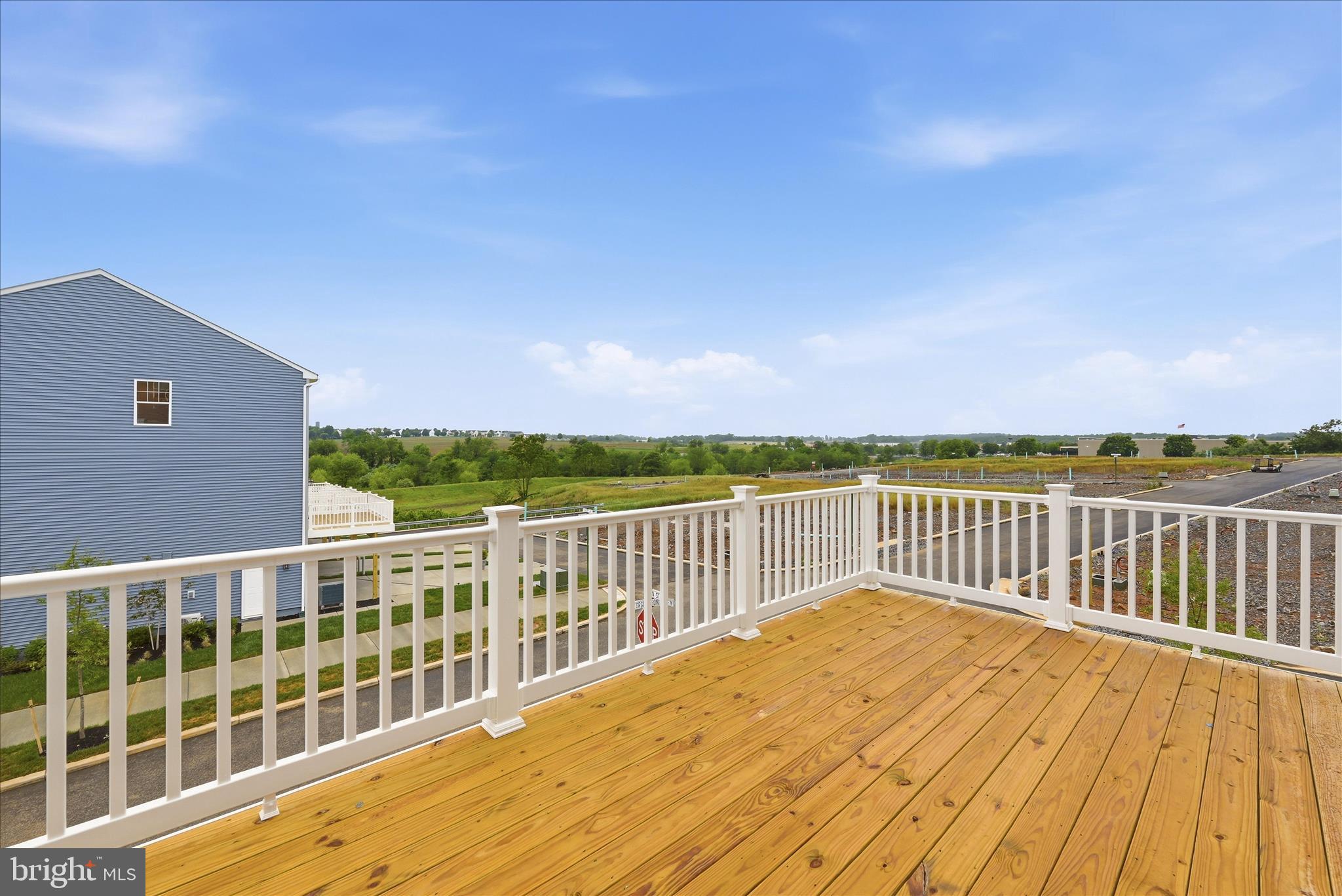 300 Presidents Pointe Avenue Ranson, WV 25438 - Photo 23 of 24 a view of a balcony with wooden floor & fence