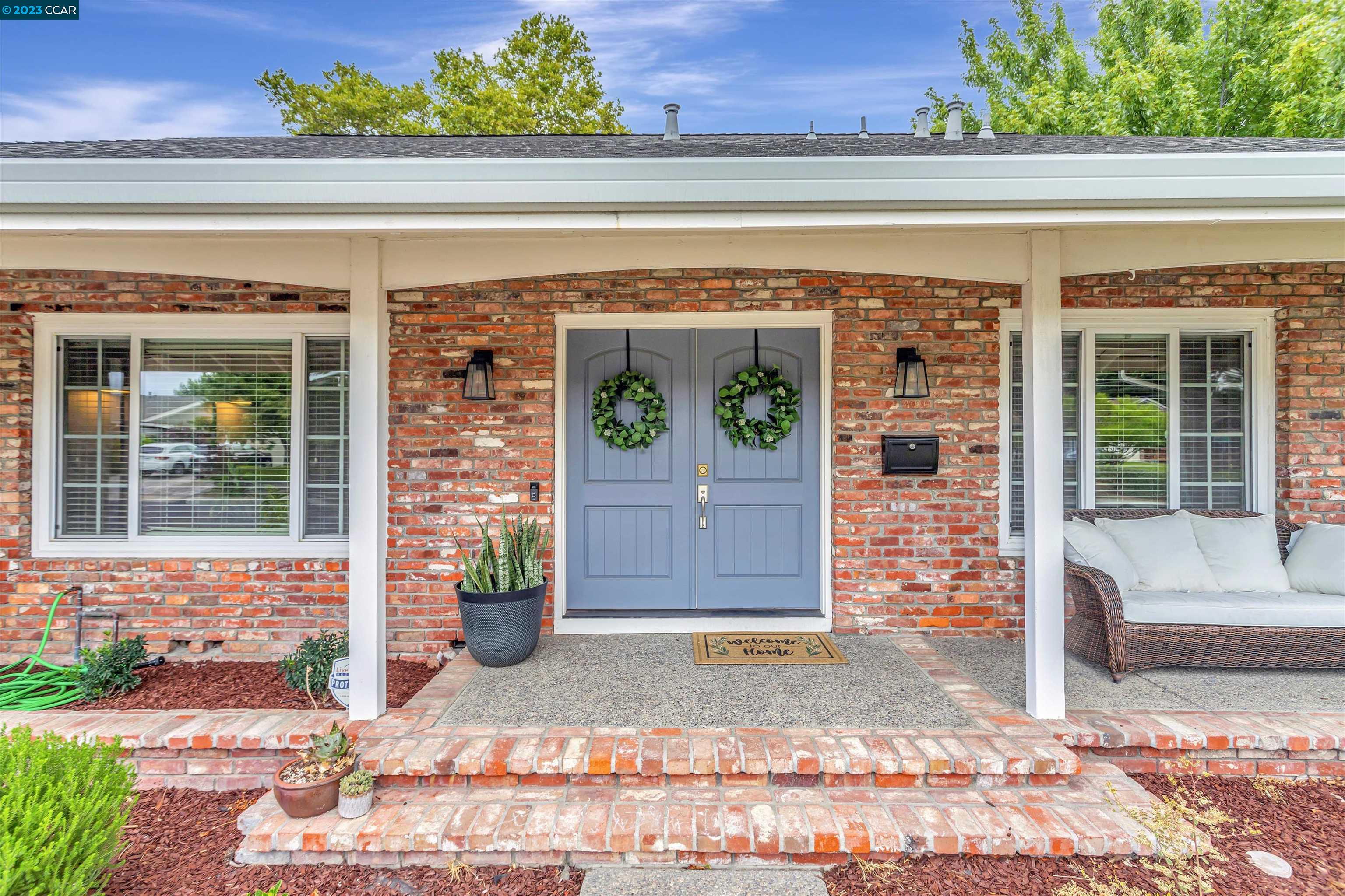 1795 Klier Drive Concord, CA 94518 - Photo 4 of 35 a front view of a house with a porch