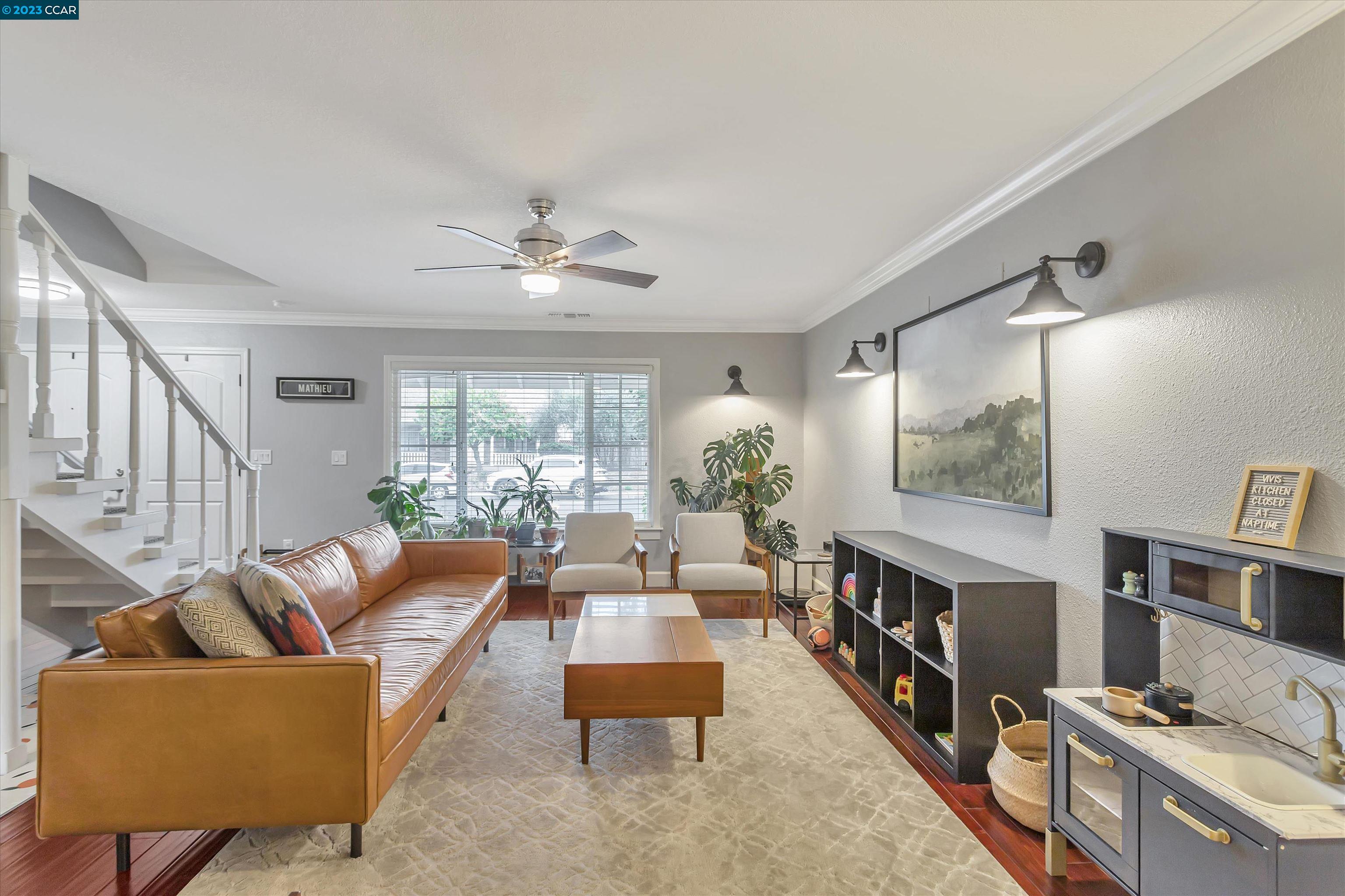 1795 Klier Drive Concord, CA 94518 - Photo 8 of 35 a living room with furniture and a flat screen tv