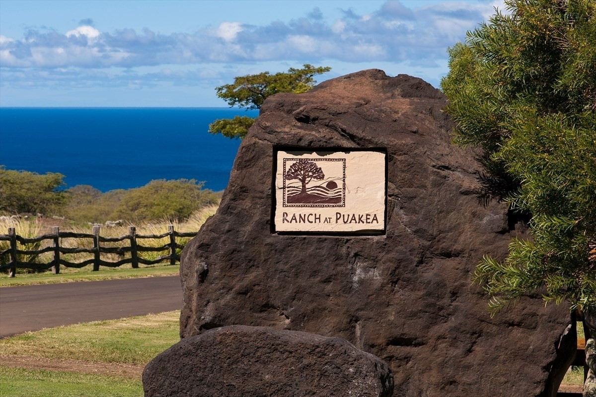 56-113 Lot 10-a Pualani Road Kamuela, HI 96743 - Photo 6 of 17 a sign that is sitting on a rock