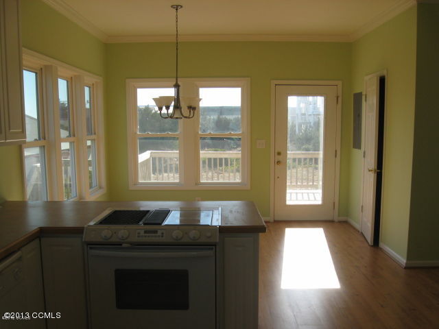 1102 West Fort Macon Road Atlantic Beach, NC 28512 - Photo 3 of 5 kitchen into dining