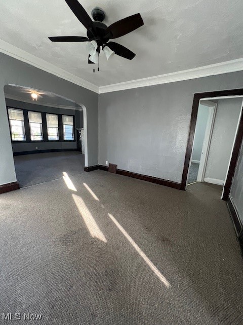 1842 Colonnade Road Cleveland, OH 44112 - Photo 16 of 47 Unfurnished bedroom featuring dark carpet, ceiling fan, and crown molding