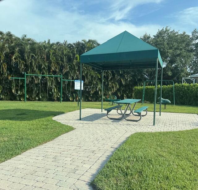2509 Southeast Springtree Place Stuart, FL 34997 - Photo 19 of 19 a view of a park with slide