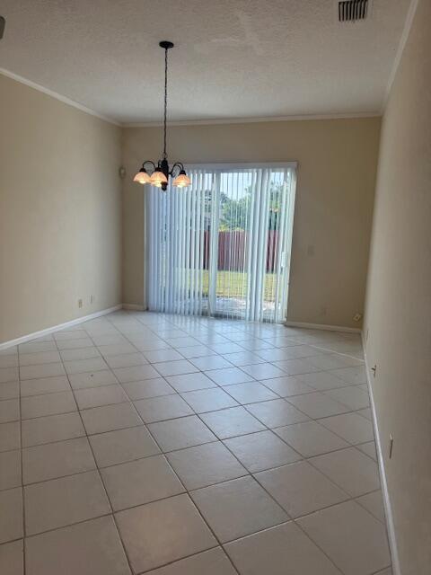 2509 Southeast Springtree Place Stuart, FL 34997 - Photo 10 of 19 a view of an empty room and window
