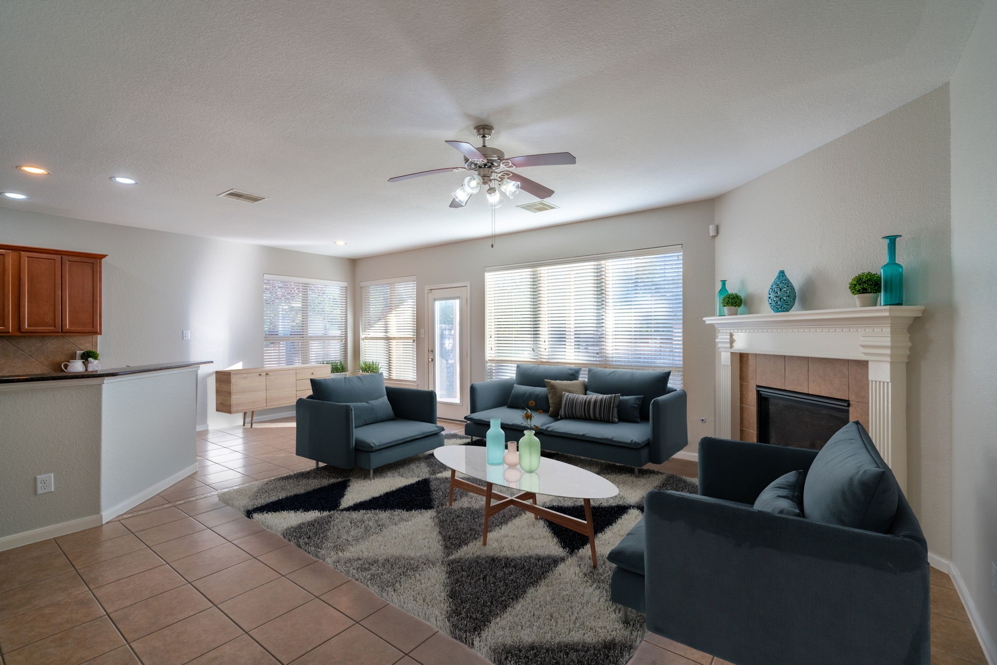 138 Magnolia Grove Lane Conroe, TX 77384 - Photo 11 of 43 a living room with furniture and a fireplace