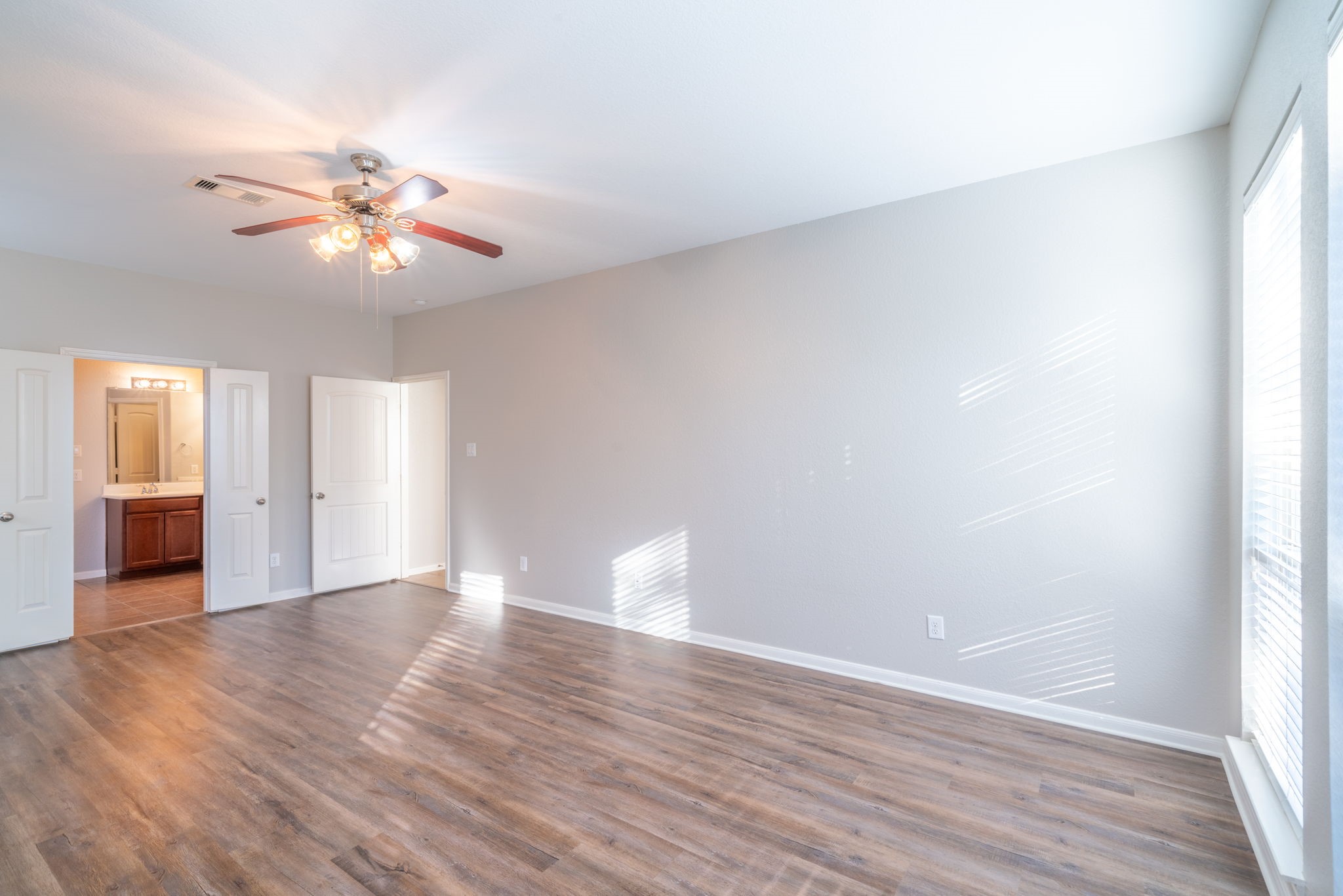 138 Magnolia Grove Lane Conroe, TX 77384 - Photo 21 of 43 a view of empty room with wooden floor