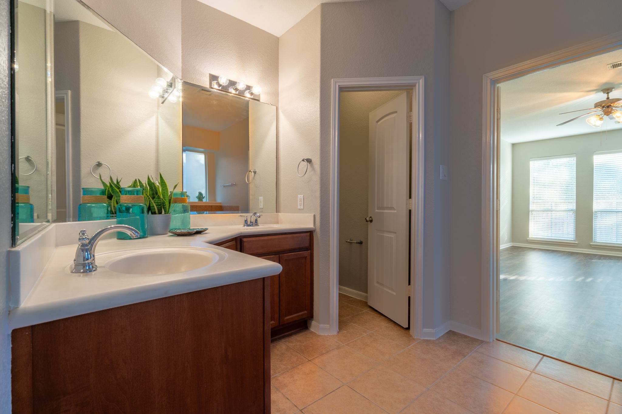 138 Magnolia Grove Lane Conroe, TX 77384 - Photo 22 of 43 a bathroom with a sink and a mirror