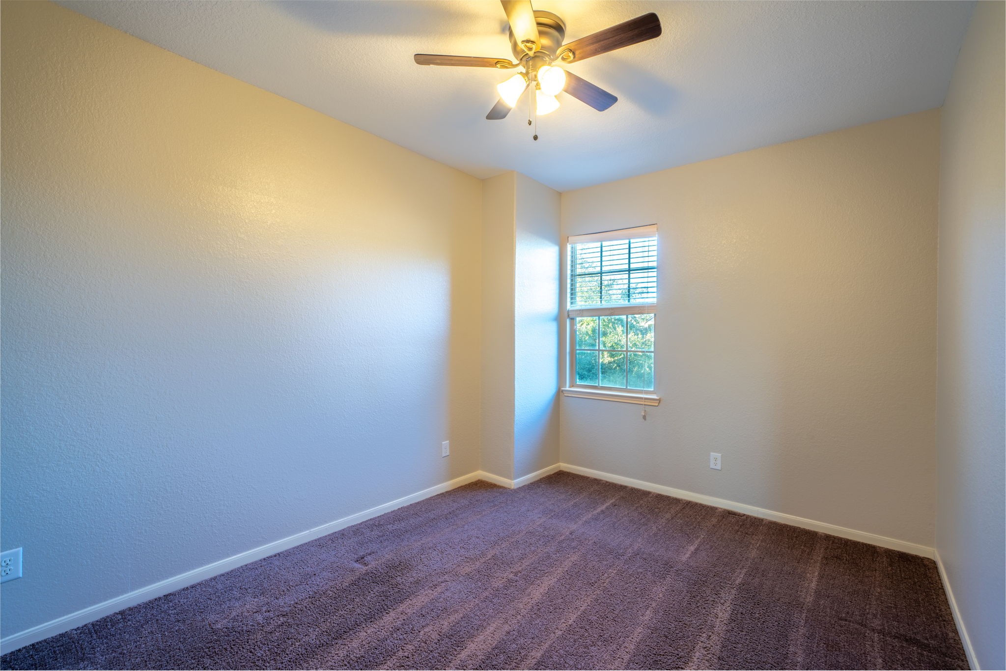 138 Magnolia Grove Lane Conroe, TX 77384 - Photo 28 of 43 an empty room with a window and a fan